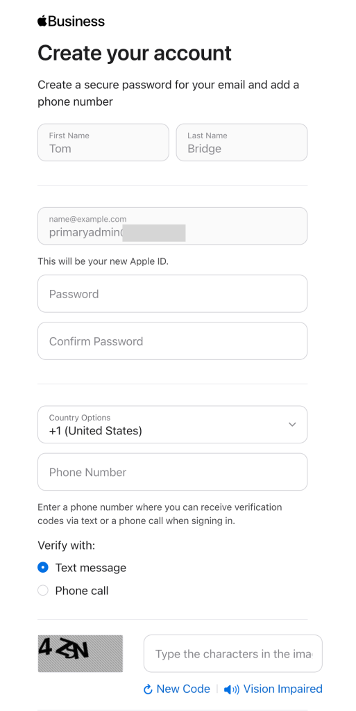 The next screen confirms your Apple ID information and password, and sets up your trusted phone number.